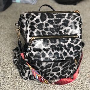 Gray leopard backpack bag